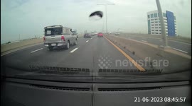 Motorist risks life by weaving in and out of traffic at high speed in Thailand