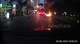 A driver is rear ended during busy rush hour traffic, causing them to hit the car infront, resulting in a car sandwich.