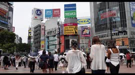 Japan: Pedestrians walk over Shibuya crossing during a heatwave in Tokyo