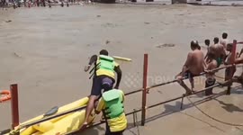 India: Uttarakhand Police SDRF doing CPR saved a Shiv devotee Kanwariya who was floating in the strong flow of Ganga at Kangra Ghat in Haridwar, Uttarakhand