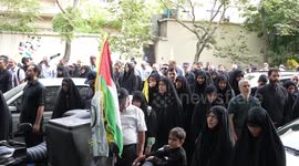 Mournful Iranians bid final farewell to Hamas chief, vow revenge