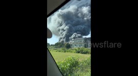 Huge fire erupts at car dealer warehouse in central Japan