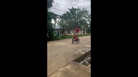 Bike rider falls into ditch in Paser Regency, East Kalimantan, Indonesia