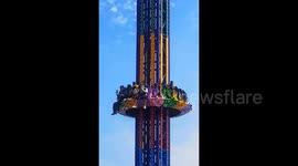 Horrifying drop tower malfunction leaves riders stranded mid-air in China