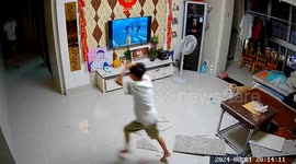 Chinese boy narrowly escapes injury as falling tiles crash down while watching TV