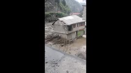 House falls into flood waters in Kaghan Valley, Pakistan