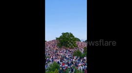 Fans watch Taylor Swift concert from hill in Munich, Germany
