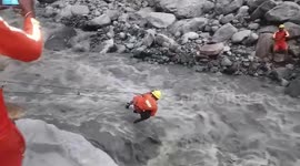Heroic! Official rescues dog while ziplining over inundated river in northern India