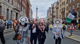 Pro-Palestine protesters dress as Biden and Netanyahu on national march in London