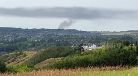 Large Smoke Cloud Forms From House Fire Burning in Springbank Area of Calgary.
