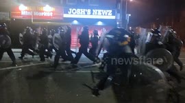 ‘Protesters’ throw fireworks as  Riot Police come under attack afterdisorder breaks out on County Road, Walton, Liverpool L4.