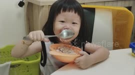 Toddler eating in Messy