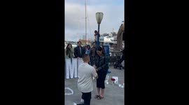 Tears and cheers when surprise proposal at Fisherman's Wharf reunites family for heartwarming moment