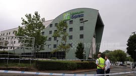 Police guard damaged Holiday Inn Express in Tamworth day after riots