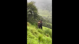 Woman who plunged 100ft down hillside while taking selfie rescued by onlookers