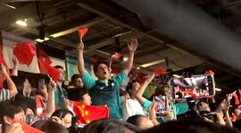 Chinese Olympic cheerleaders gee-up crowd at table tennis match against Korea