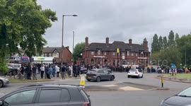 Tensions in Birmingham as men in balaclavas gather amid far-right march rumours