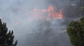 USA: San Bernardino Brush Fire With Structures Destroyed
