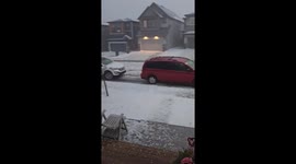 Huge hail storm batters Calgary turning the roads into a torrent of ice
