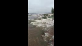 Pond and River overflow, road collapsed amid heavy rains in India
