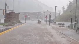 Motorcycle Rides Through Downtown Deadwood in Pouring Rain