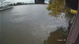 River surges into restaurant as diners eat at tables