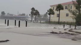 Flooding and high waves in Holmes Beach, Florida due to hurricane Debby