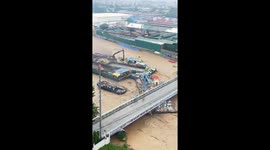 Typhoon Gaemi causes barges to collide and overturn under Caruncho Bridge in Pasig City
