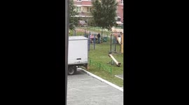 Drunk woman kicks and chases police in Tyumen, Russia