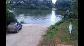 Police boat overturns after colliding with cable ferry in Hungary