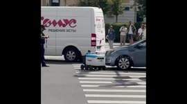 Car collides with delivery robot at pedestrian crossing in Moscow, Russia