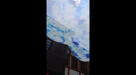 Enjoy cool shade under tie-dye canopy in China's Chongqing