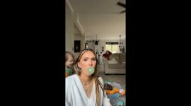 Boy Pops Mom's Bubble