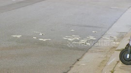 USA: Business Break In With Money Left Scattered in Street