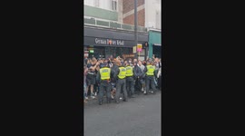 Far-Right Protester clashes with Anti-facist demonstrators at a rally in North Finchley, London