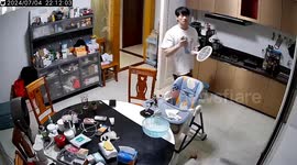 Chinese man startled by cockroach during extermination attempt