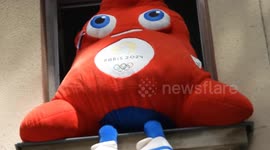 A Phryge, mascot of the Paris Olympics and Paralympic 2024 Games spotted sat on the edge of a window next to the Chateau de Versailles.  The Phryges come from the famous Phrygian cap. A revolutionary symbol of the Republic and freedom, Marianne's headgear