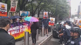 August 8th 2024 - Climate Protest and Arrest at CITI Bank Head Quarters in New York City USA  At least 6 activist arrested, including John Mark a professional cellist.