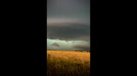 Enormous, and spectacular, supercell over Calgary, Canada bringing frequent lightning, huge hailstones and torrential rain