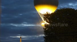Paris Olympics 2024: The flying cauldron rises in the parisian sky from the Jardin des Tuileries garden, next to the Louvre Museum, France. 8 aug 2024.