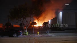 USA: Montebello Large Commercial Fire With Neighbor Speaking On Camera