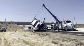 USA: Crews Uprighting Overturned Big Rig on State Route 14