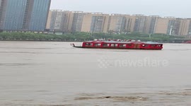 River cruise ferry crashes into bridge and sinks in China