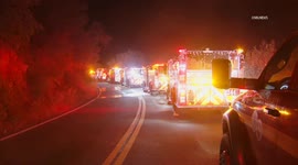 USA: Angeles National Forest Vehicle Over the Side and Catches Fire Along With Hillside