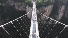 Celebrations held for Qixi Festival on glass bridge in China's Zhangjiajie