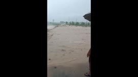 Bus washed away by floods killing two and leaving six injured