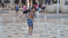 Spain: Tourists Enjoy a Perfect Day at the Beach and La Explanada in Alicante