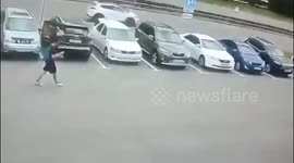 Muddy water sprays onto parked car after testing reveals ground failure in Russia