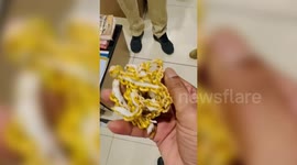 Customs officials seize 1.028 pounds of gold hidden in shoe soles at airport in southern India