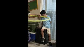 Young boy falls as the box collapses at the family gathering
